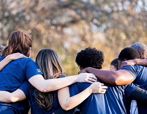 A Group of Young People Embracing